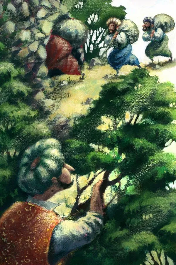 A man peering through green branches as robed thieves carry heavy sacks up a rocky path